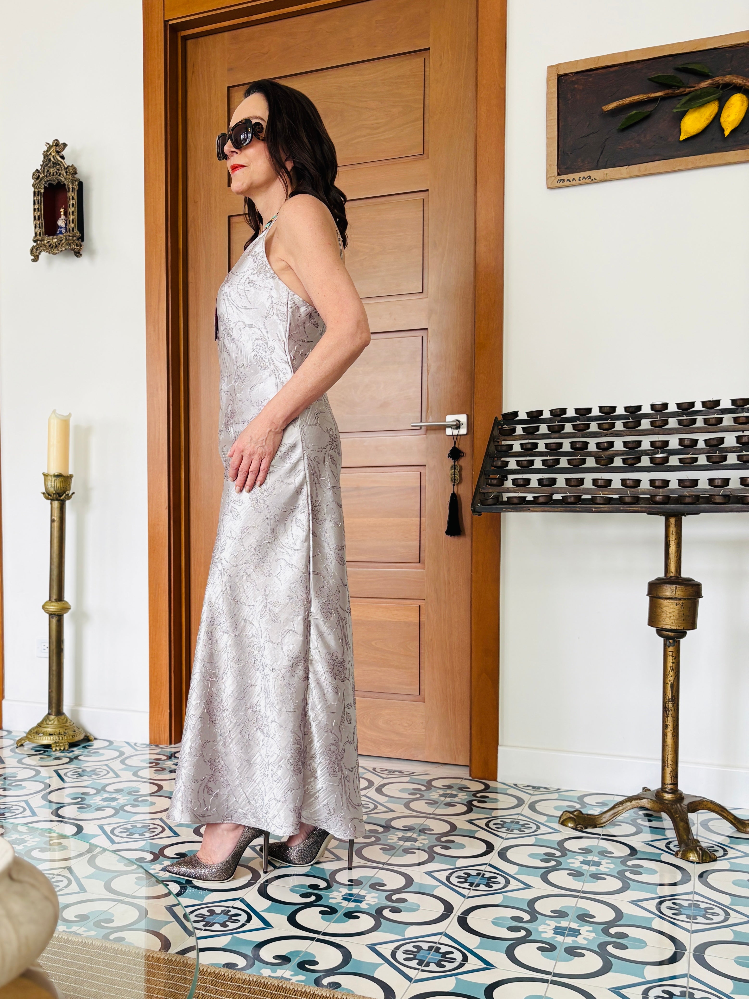 Side view of dusty rose strappy maxi dress showcasing elegant silhouette and soft drape