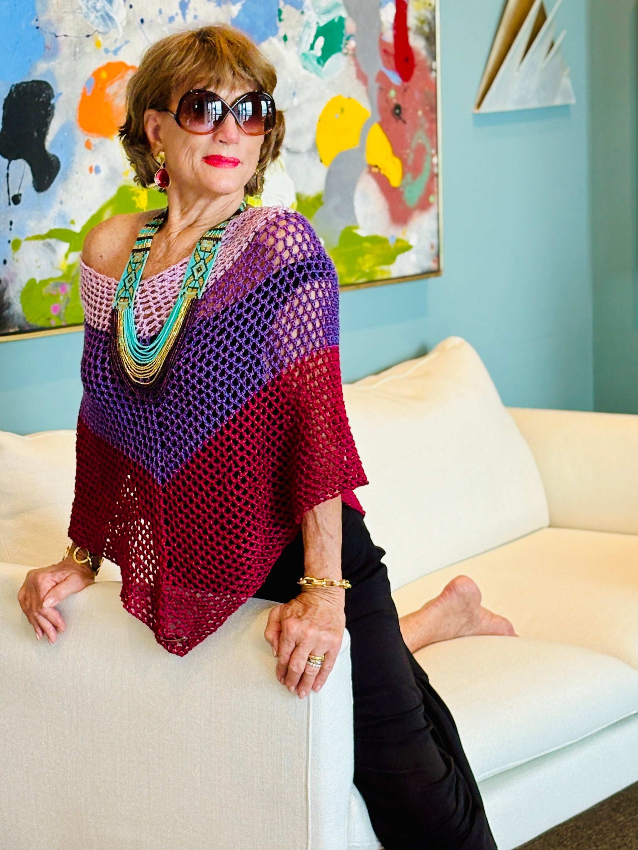 Elegant pink purple poncho styled for evening wear