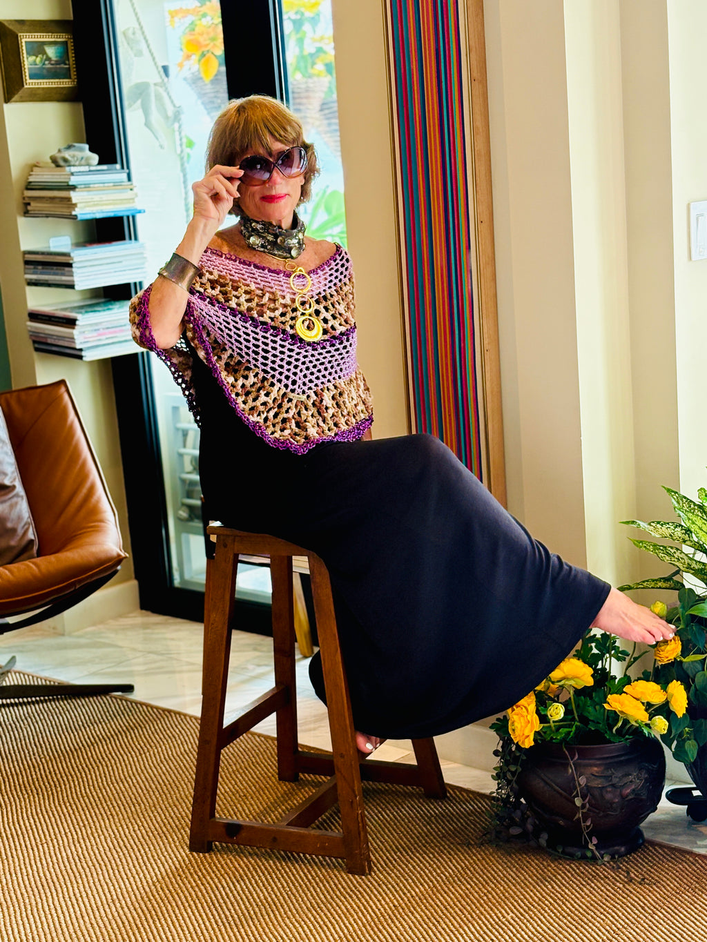 Bold purple tiger pattern poncho styled for confident elegant look