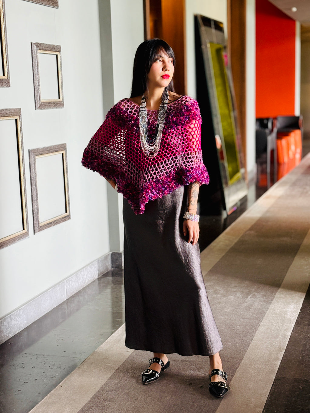 Elegant poncho worn for evening style and refined look