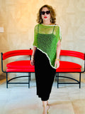 Green asymmetrical handmade poncho by Vega Fashion styled on model
