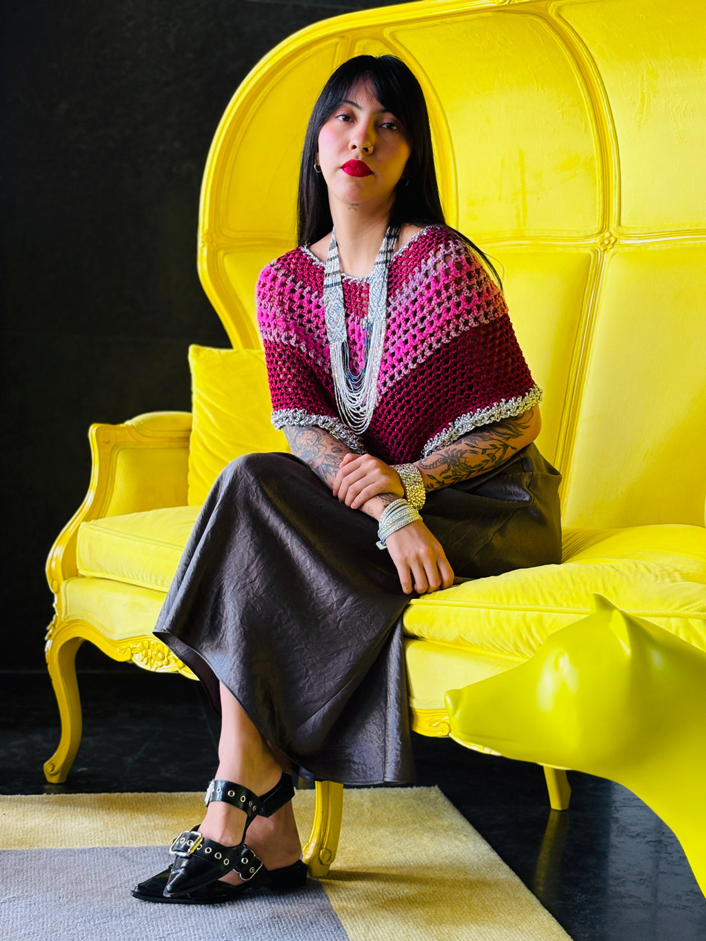 Pink rainbow handmade poncho by Vega Fashion styled on model