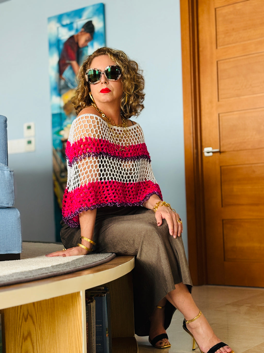 Elegant pink velvet crochet poncho styled for modern fashion look
