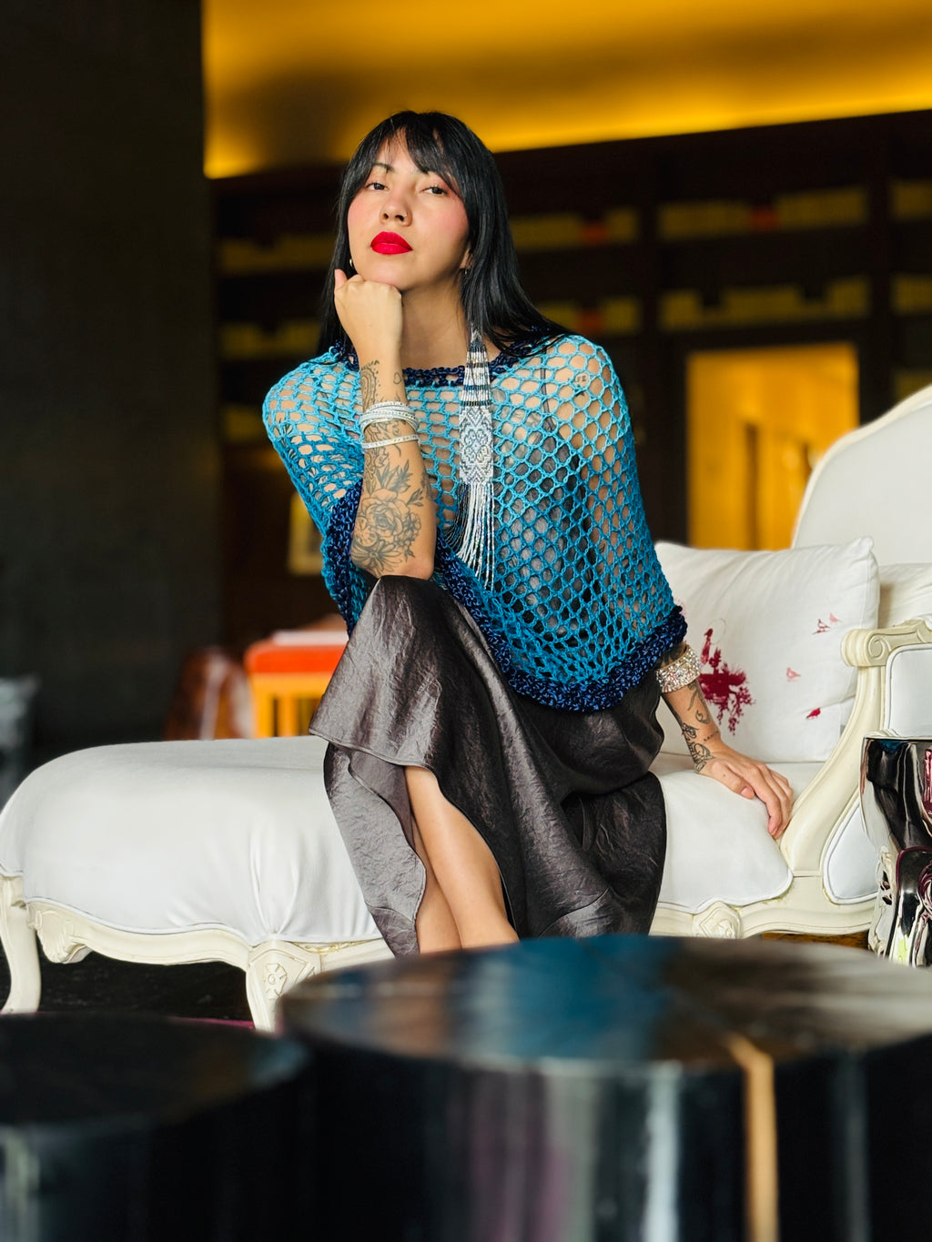 Back view of handmade two tone blue poncho