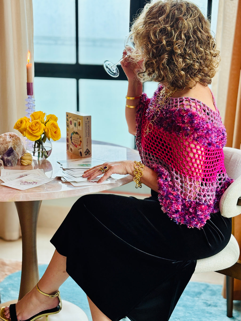 Pink blend poncho styled casually with modern outfit