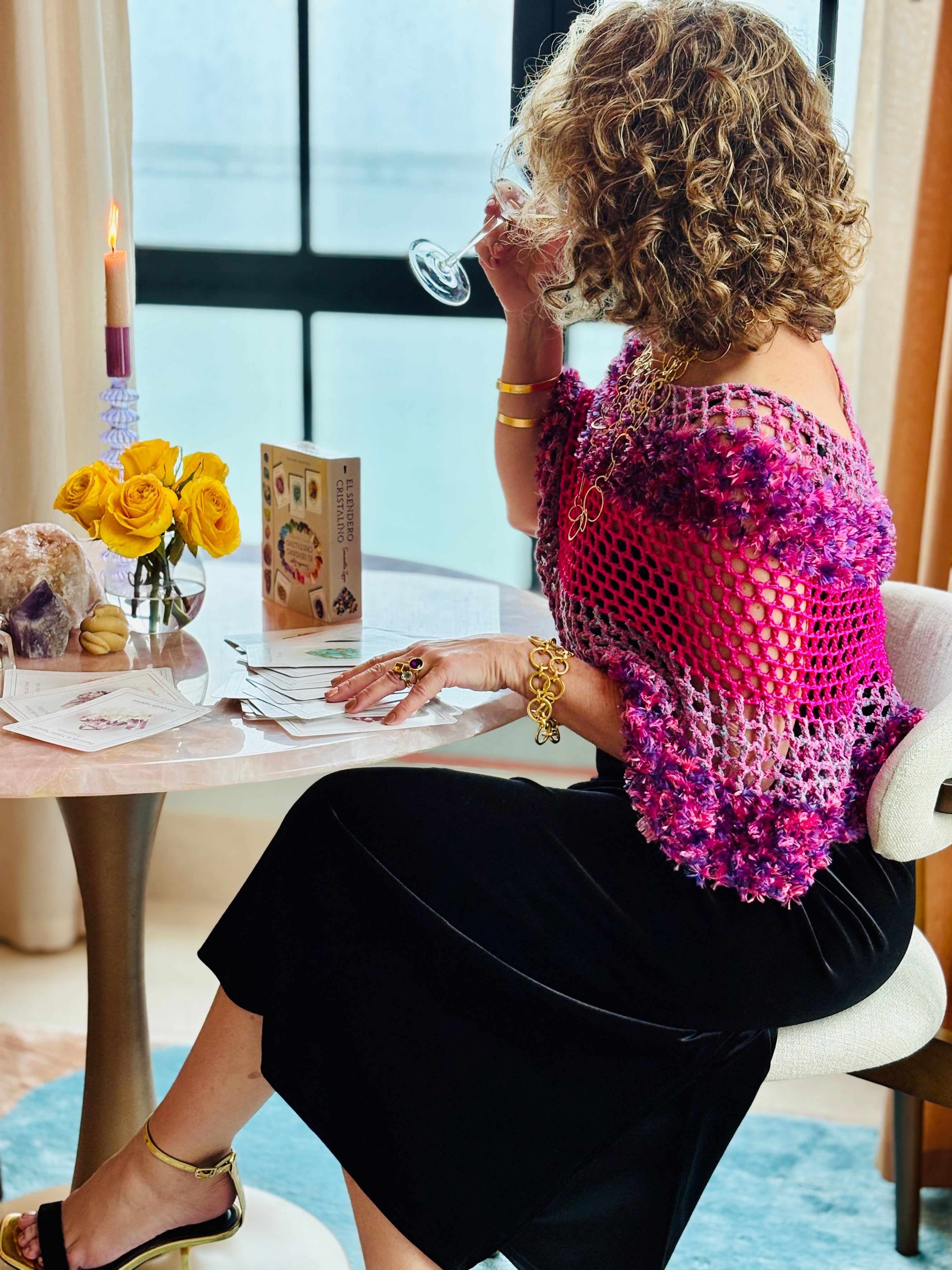 Pink blend poncho styled casually with modern outfit
