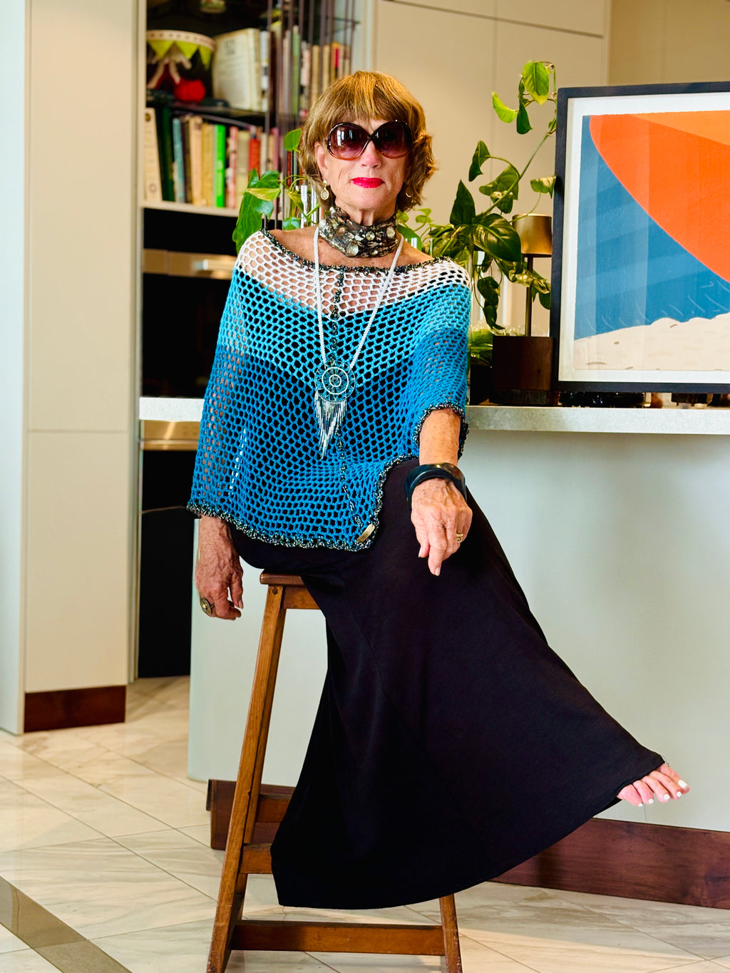 Handmade crochet Stillwater poncho by Vega Fashion styled on model