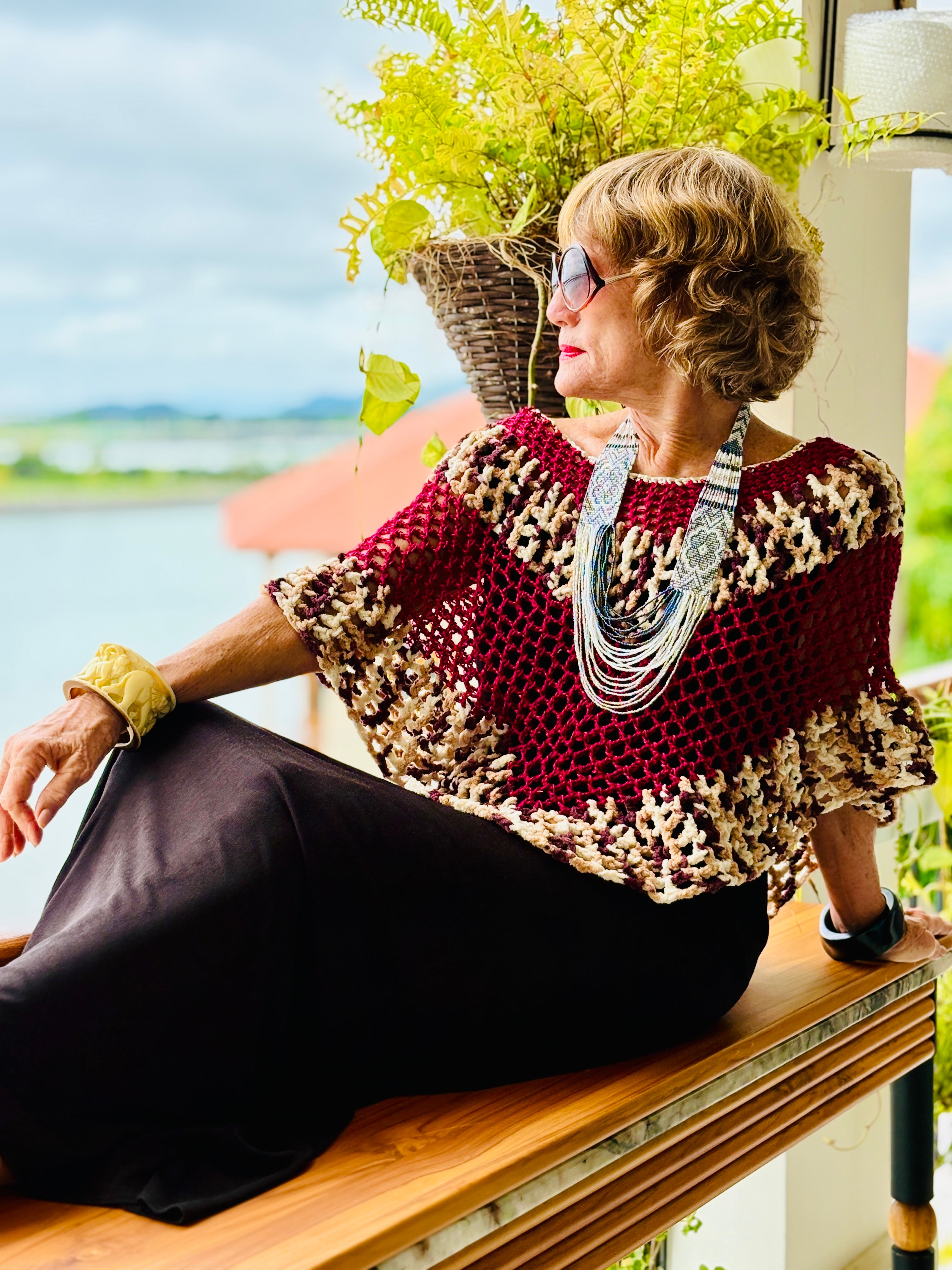 Close style view of handmade bordeaux tiger series poncho by Vega Fashion